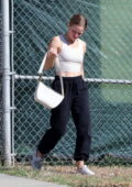 Kristen Bell shows off her athletic body in tank top and joggers while heading for a workout in Los Feliz, California