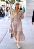 Paris Hilton looks lovely in a patterned pink dress while making an appearance at Maje store at the Grove in Los Angeles