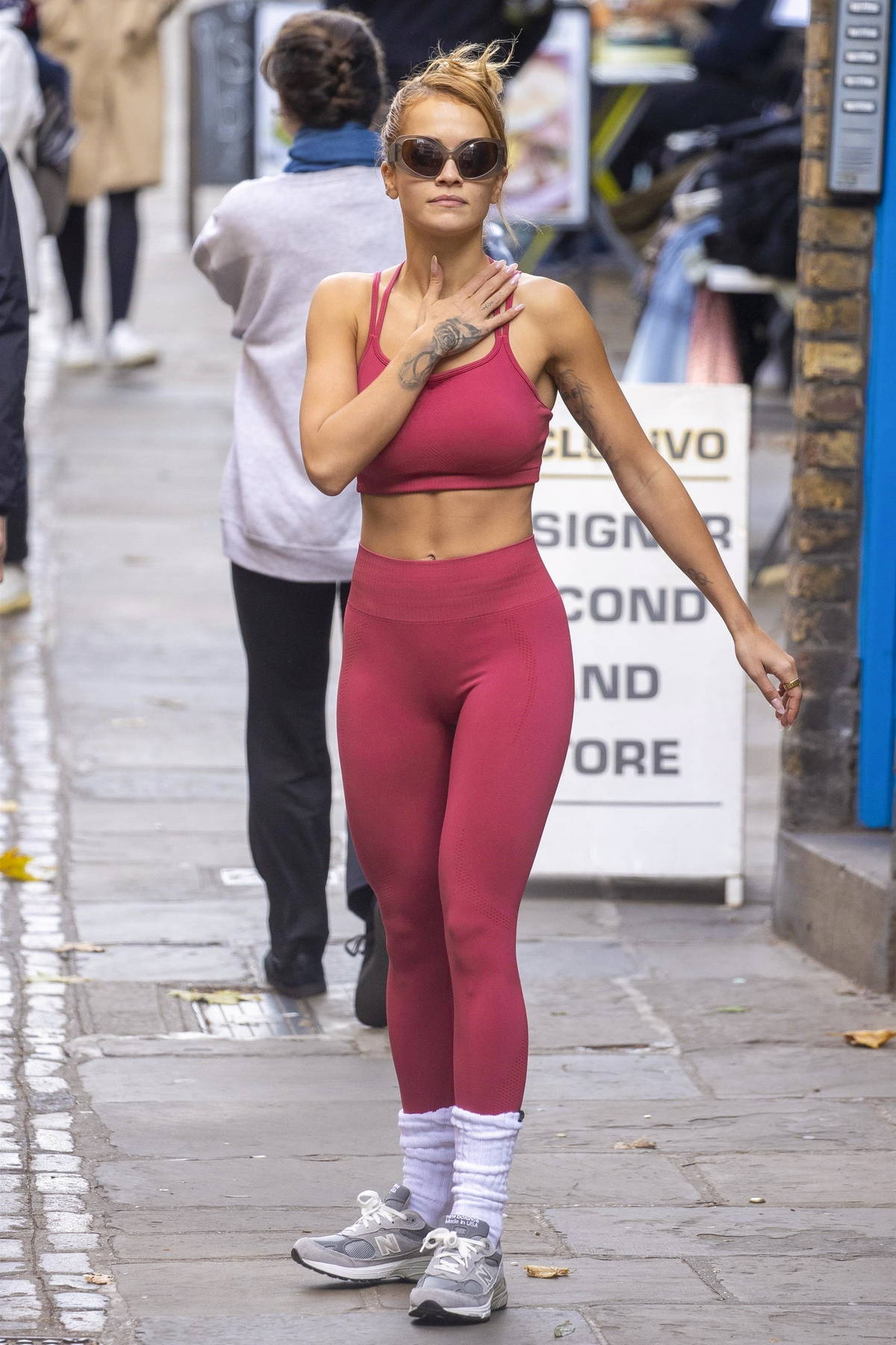 Rita Ora shows off her taut physique in a pink sports bra and leggings as  she leaves a Pilates class in London, UK