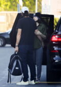 Alexandra Daddario kisses her husband Andrew Form goodbye while she drops him off at work in Los Angeles