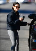 Lucy Hale sports black puffer jacket and heather grey leggings as she stops for a post-workout coffee in Los Angeles