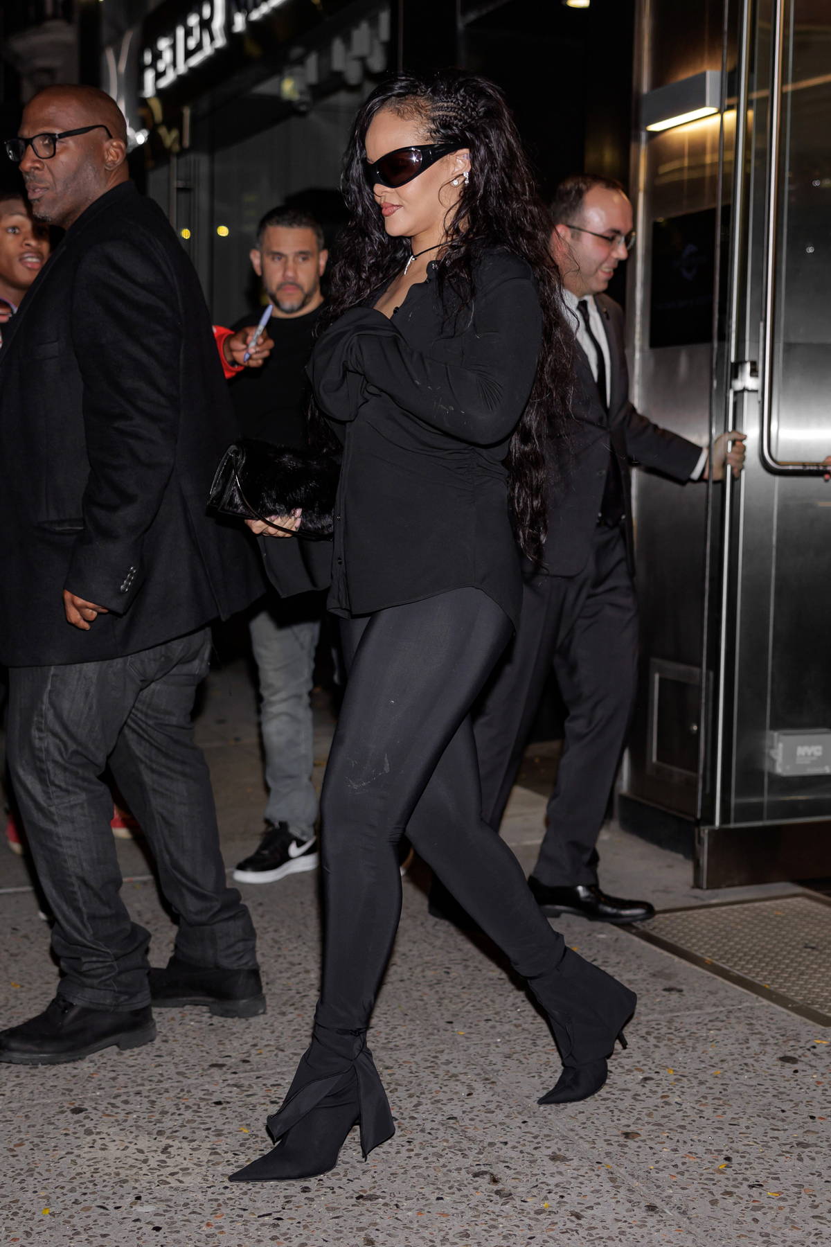 https://www.celebsfirst.com/wp-content/uploads/2022/11/rihanna-looks-stunning-a-black-shirt-with-matching-leggings-and-heels-while-stepping-out-for-dinner-in-new-york-city-051122_19.jpg