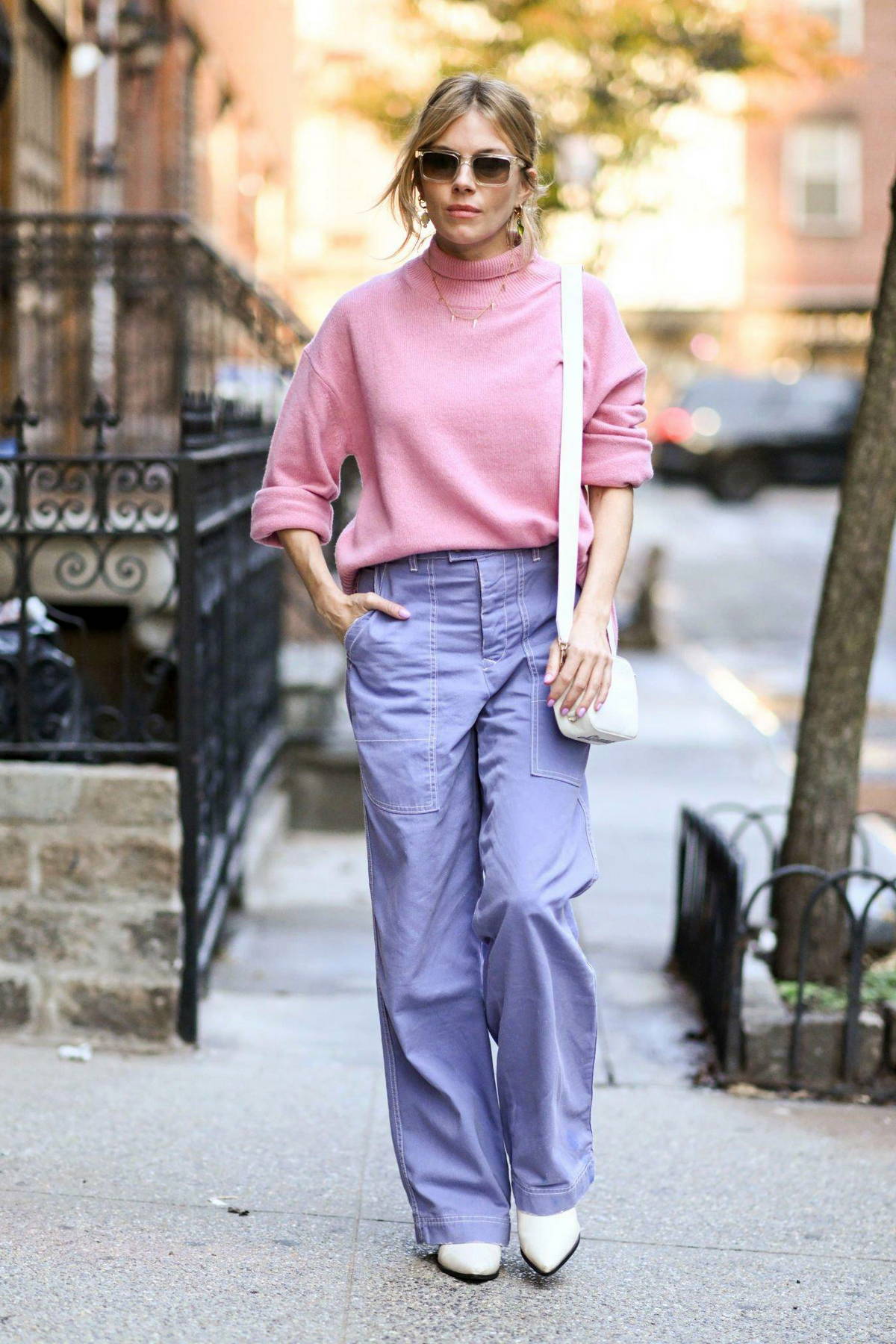 Sienna Miller looks pleasant in a pink sweater and lavender pants while out  running errands in