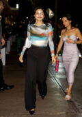 Camila Mendes looks good in a semi-sheer top while out to dinner with a friend at Papi Steak in Miami, Florida