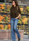 Cindy Crawford wears a hoodie and jeans while she goes shopping ahead of Christmas in Malibu, California