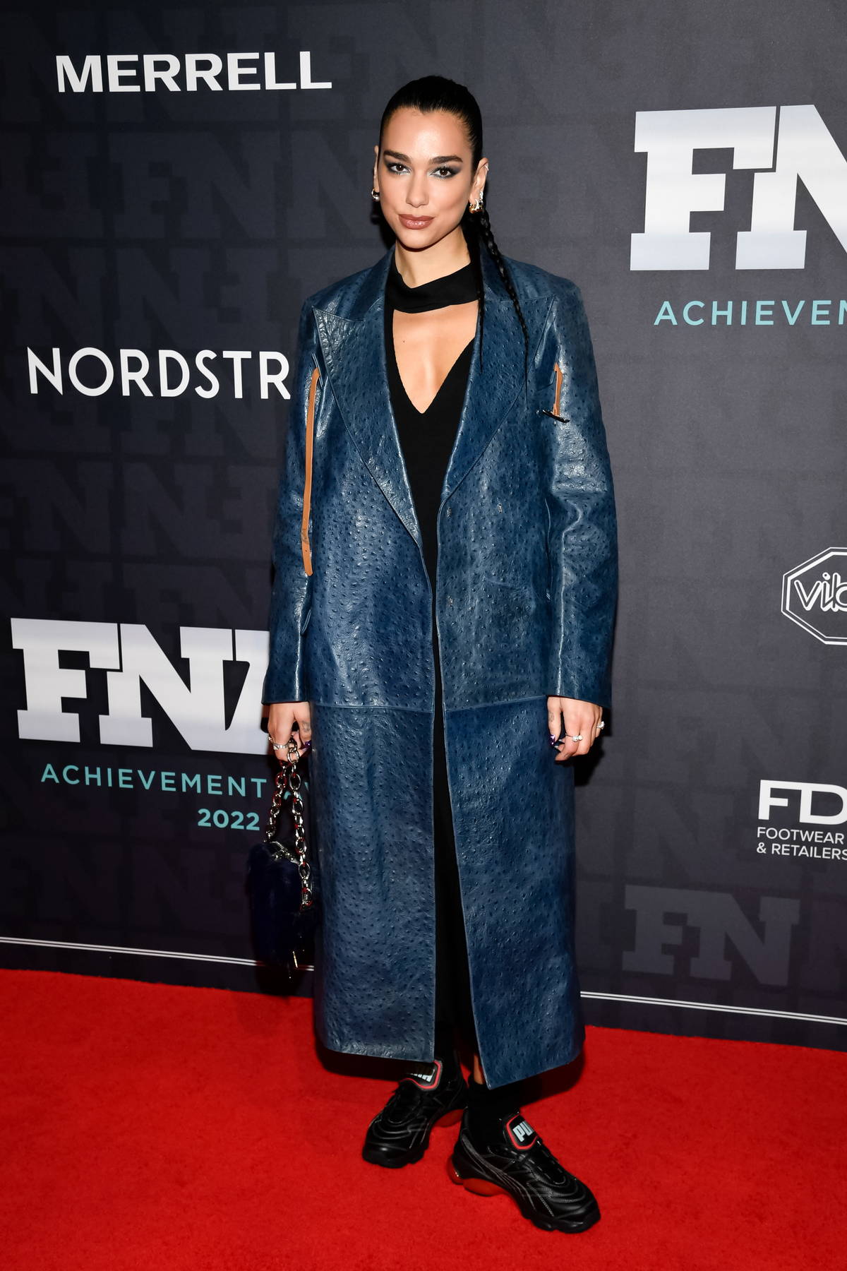 Kiernan Shipka wears a quilted jacket and leggings as she heads