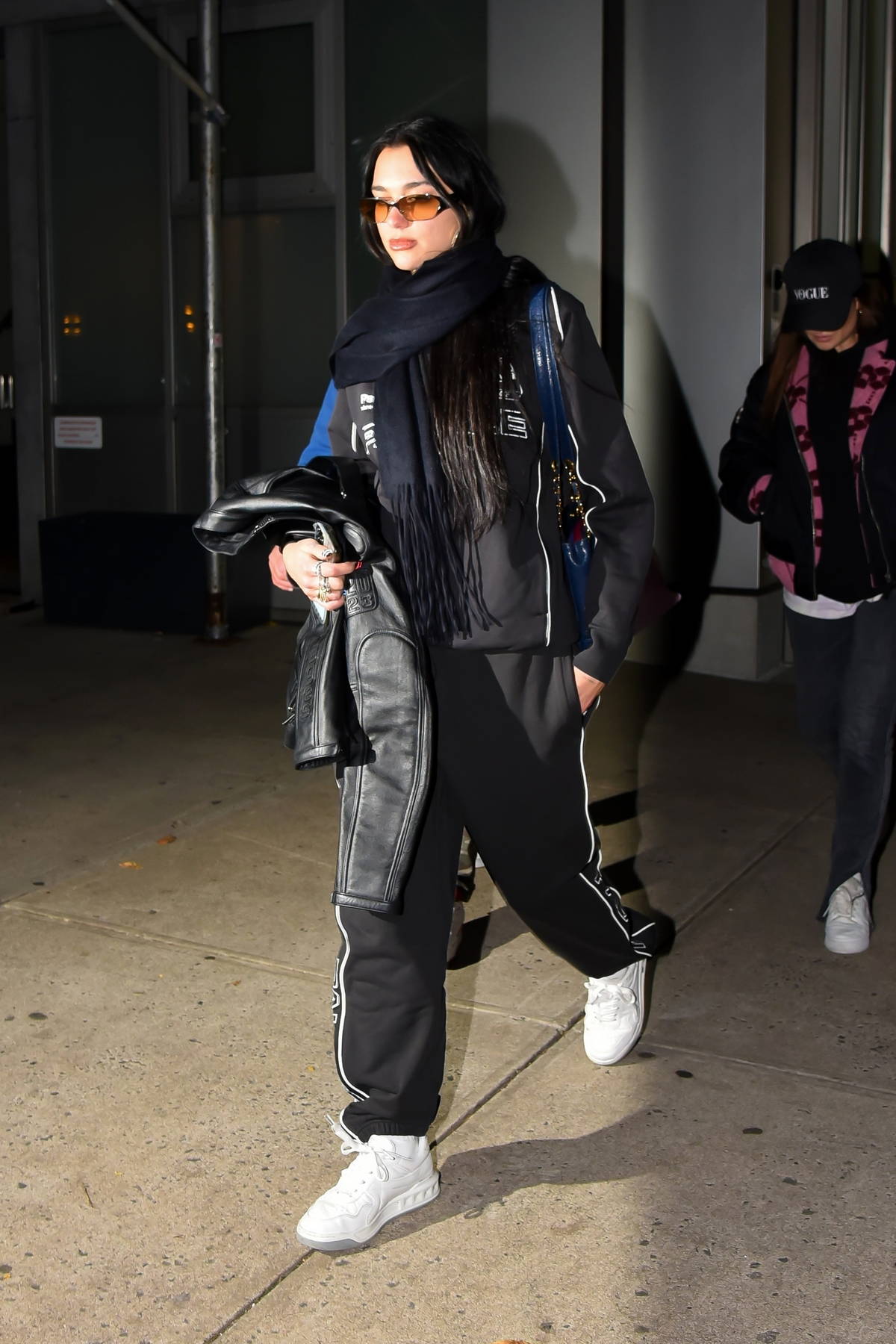 dua lipa keeps it casual yet trendy as she heads out to the airport in new  york city-101222_6