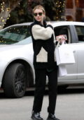 Emma Roberts enjoys some solo Christmas shopping around Melrose Place in Los Angeles