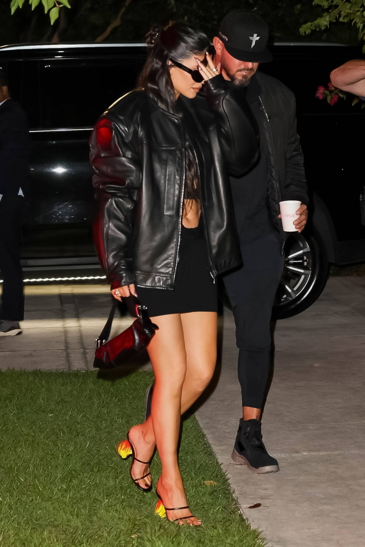Kylie Jenner rocks black leather jacket and sweatpants as she