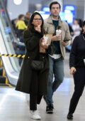 Olivia Munn and John Mulaney grab Wendy's fast food as they touch down at LaGuardia Airport in New York City