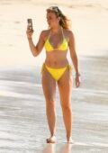 Tallia Storm looks amazing in a yellow bikini as she enjoys the sun at the beach in Bridgetown, Barbados