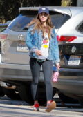 Alison Brie dons a denim jacket, mickey mouse top and leggings while out for a hike at Griffith Park in Los Feliz, California