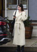 Camila Morrone goes makeup free while heading out wearing a knitted robe and wet hair in West Hollywood, California