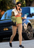 Eiza Gonzalez wears a colorful top and beige leggings as she leaves the gym West Hollywood, California