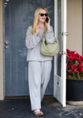 elle fanning keeps it casual and comfy in grey sweatsuit while