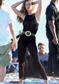 Gisele Bundchen stuns in a black see-through coverup while posing for a beach photoshoot in Hollywood, California