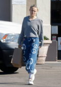 Kristen Bell wears a 'Mickey Mouse' sweatshirt and leggings as she