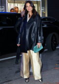 Katie Holmes wears a leather jacket, shimmery wide-leg pants and metallic pumps while visiting 'GMA' in New York City