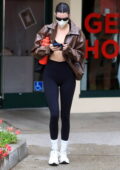 kendall jenner wears a green nautica jacket and black leggings while  attending a hot yoga class in west hollywood, california-050123_2