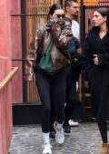 Kendall Jenner rocks a leather jacket with black leggings as she attends a  yoga session in
