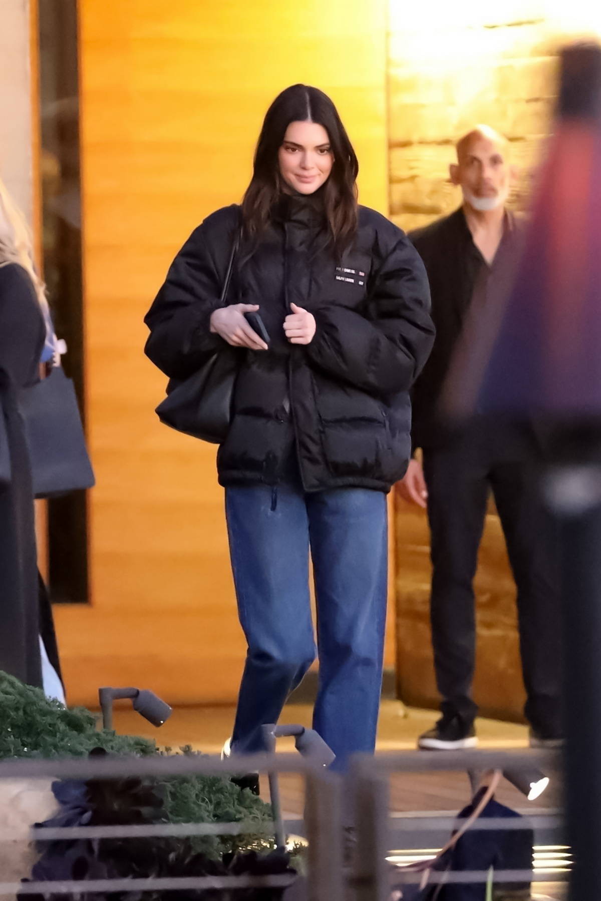 Kendall Jenner Wears A Puffy Jacket And Blue Jeans For Dinner With Friends At Nobu In Malibu