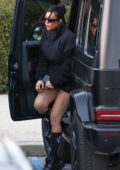 Kourtney Kardashian shows some legs while visiting her husband Travis Barker at his studio in Calabasas, California