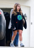 Addison Rae shows some legs in an oversized sweater while she and boyfriend Omer Fedi go house hunting in Los Feliz, California
