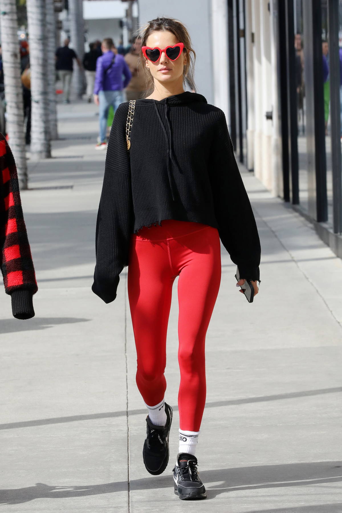https://www.celebsfirst.com/wp-content/uploads/2023/02/alessandra-ambrosio-rocks-red-leggings-with-matching-heart-shape-sunglasses-while-out-on-valentines-day-in-beverly-hills-california-140223_11.jpg