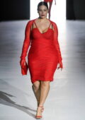 Ashley Graham walks the runway for the Dolce & Gabbana FW23 show during Milan Fashion Week in Milan, Italy