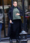 Ashley James covers her baby bump stepping out from Soho Radio in London, UK