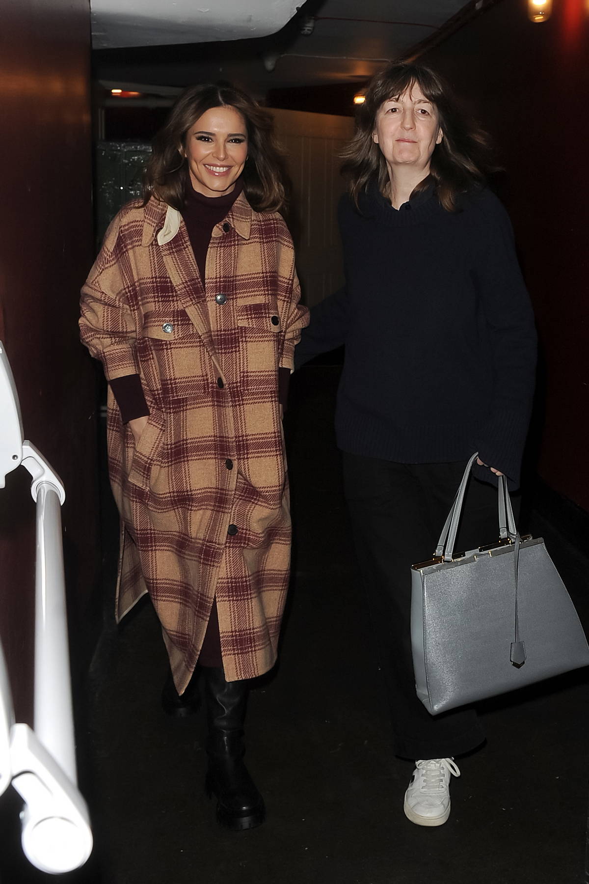 Cheryl Tweedy is all smiles as she leaves the Lyric Theatre in London, UK