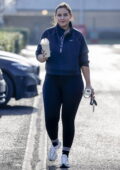 Jacqueline Jossa sips on her post-workout drink as she leaves the gym sporting a Nike pullover and leggings in Essex, UK