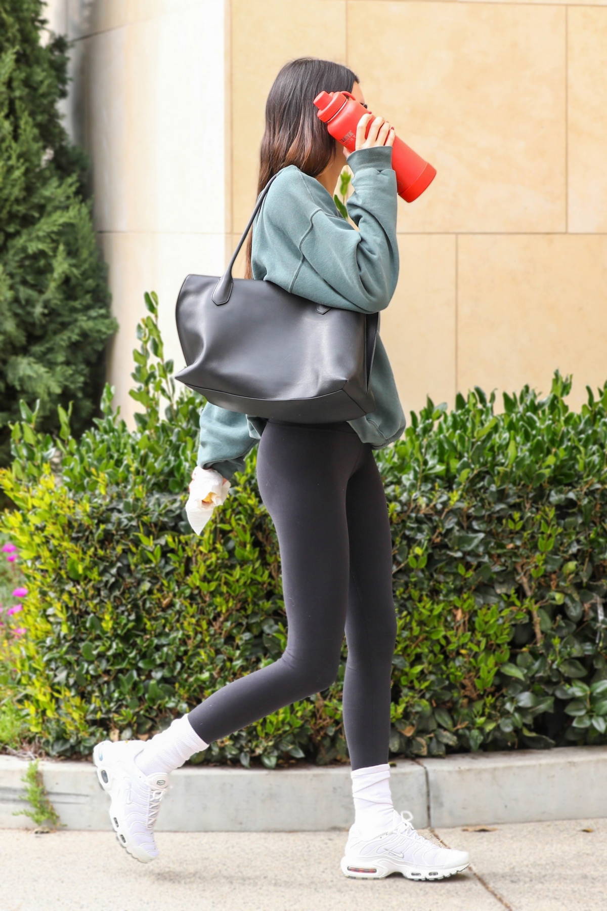 Kendall Jenner sports a sweatshirt and leggings while heading for a Pilates  class in West Hollywood