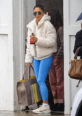 Nicole Scherzinger flaunts her curves in blue leggings while visiting her stylist on a rainy day in Beverly Hills, California