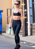 Olivia Wilde displays her taut physique in a tiny sports bra and
