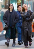 Amelia Hamlin wears a plaid dress with a bomber jacket and leather boots while out with Heather Blair in New York City