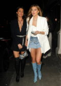 Arabella Chi gets leggy in a denim mini skirt while enjoying a girls night out at IT restaurant in London, UK