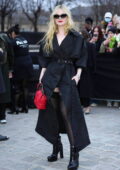 Elle Fanning attends the Alexander McQueen SS24 show during Paris Fashion  Week in Paris, France