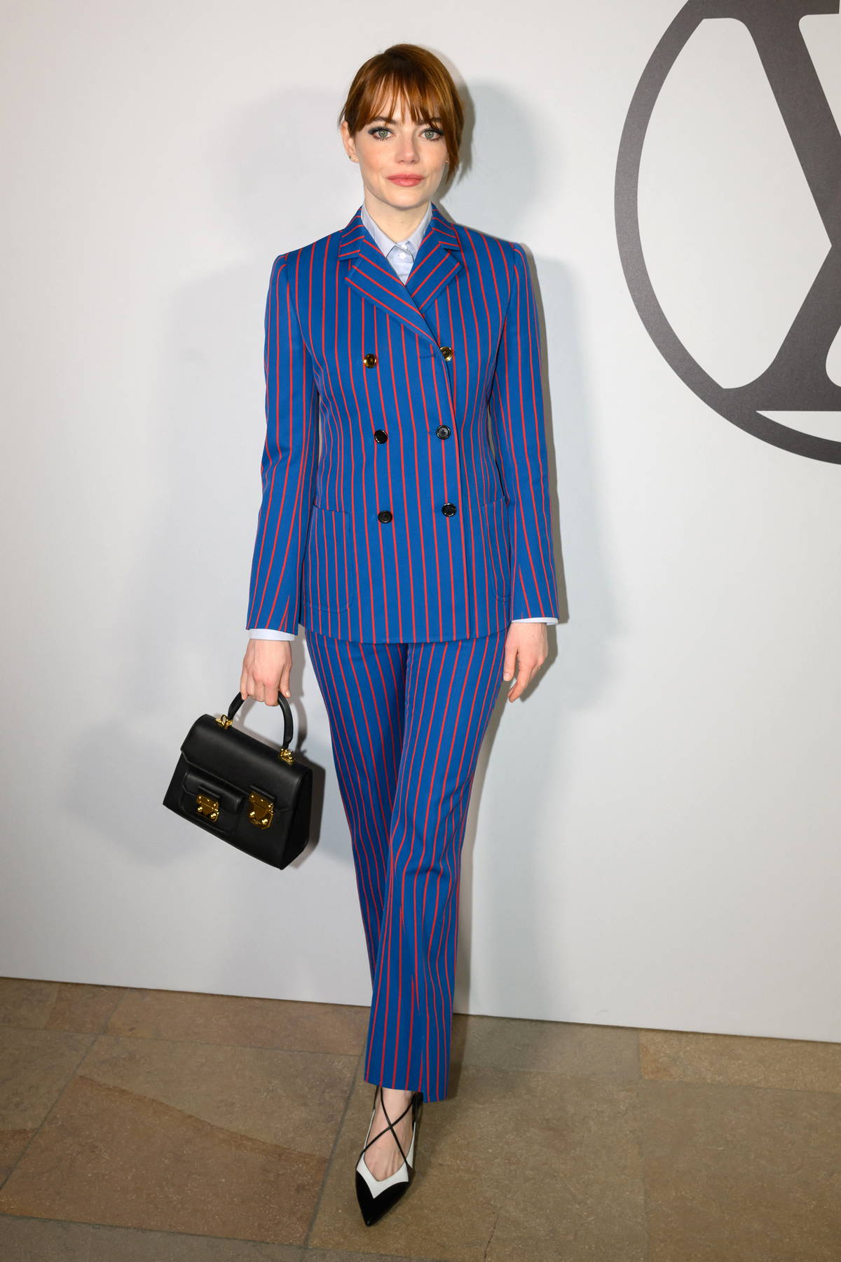 Emma Stone attends the Louis Vuitton Womenswear FW 2023-24 show during  Paris Fashion Week in Paris, France