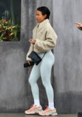 Karrueche Tran displays her toned legs in light blue leggings as she leaves after lunch at Crossroads in Los Angeles