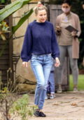 Kate Hudson is all smiles as she leaves after visiting a friend's house in Brentwood, California