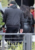 Kylie Jenner hides behind her bodyguard as she leaves after lunch with Fai Khadra at Nobu in Malibu, California