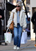 Olivia Wilde keeps cozy in a teddy fleece while out shopping with her brother Charlie in New York City