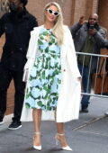 Paris Hilton looks lovely in a floral print dress and white coat while promoting her new book at 'The View' in New York City