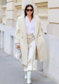 Sara Sampaio looks stylish in a cream coat with matching skirt and white shirt while out in Paris, France