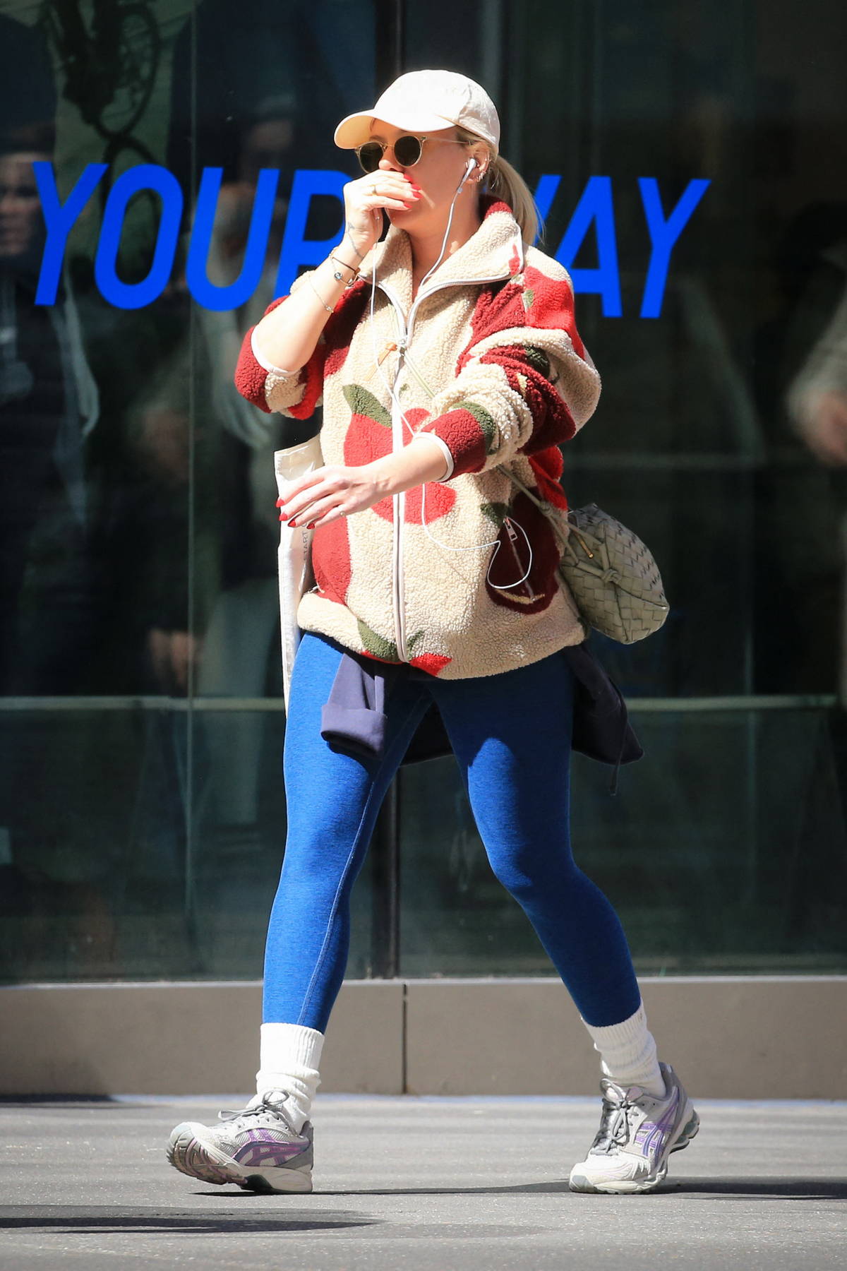 Scarlett Johansson keeps it casual in a colorful fleece and blue