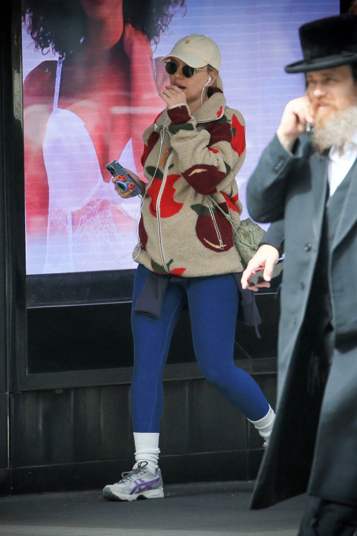 Scarlett Johansson keeps it casual in a colorful fleece and blue leggings  as she hits the