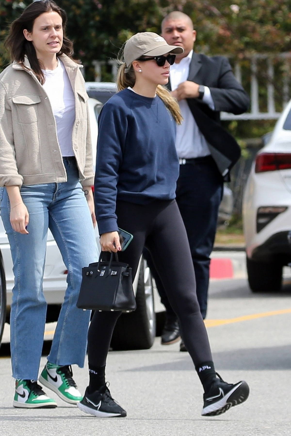 sofia richie sports a navy sweatshirt and black leggings while out for some  shopping with a friend in santa monica, california-170323_10
