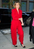 Elizabeth Olsen look striking in a red pantsuit as she leaves 'The Late Show with Stephen Colbert' in New York City
