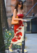 Emily Ratajkowski looks radiant in a red and white tie-dye dress while stepping out in New York City